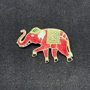 Stunning enamel elephant brooch